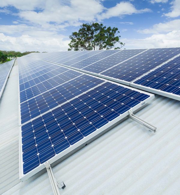 Solar panels on factory roof.